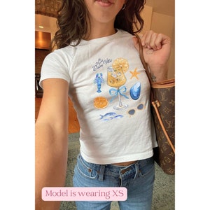 La Dolce Vita Baby Tee Painted Collage 90s Style Baby Tee Spritz Baby Tee Ciao Bella Abuela Costera Nieta Costera Italia Baby Tee