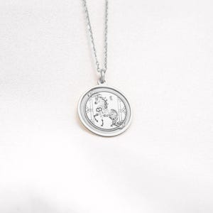 14k white gold Year of the Horse necklace photographed on a clean background, showing the cool-toned metal finish and the engraved Chinese zodiac horse motif on a round medallion. The Horse symbolizes freedom, energy, and forward movement, making it perfect for Lunar New Year or zodiac birthday gifting. SEO: white gold horse necklace, chinese zodiac pendant, zodiac necklace, astrology jewelry, medallion charm, handcrafted engraving-ready necklace for keepsakes.