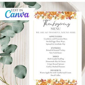 May include: A Thanksgiving menu with a fall-themed design featuring pumpkins, leaves, and berries. The menu includes appetizers, entrees, sides, and desserts. The text reads "Thanksgiving Menu" and "We are so thankful you're here".