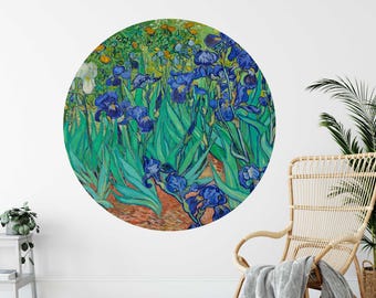 May include: A circular wall decal featuring a vibrant painting of blue irises with green leaves and stems. The painting is reminiscent of the style of Vincent van Gogh.