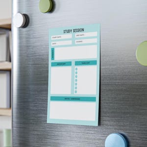May include: A light blue magnetic notepad with the words "Study Session" at the top. The notepad has sections for start and end dates, course, subject, important notes, task list, and reminders. The notepad is attached to a silver refrigerator.