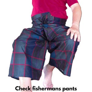 May include: Checkered fisherman's pants in shades of blue, black, and red. The pants have a wide-leg design and are tied at the waist. The text "Check fishermans pants" is at the bottom of the image.