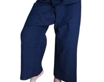 May include: Dark navy blue wrap-style trousers featuring a wide-leg silhouette and a folded waistband design. The pants are constructed from a solid-colored fabric and extend to the lower calf area, paired with a plain brown top.