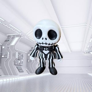May include: A figurine of Jack Skellington from The Nightmare Before Christmas. The figure has a white head with large black eye sockets and a stitched mouth. It wears a black and white striped suit with black shoes.