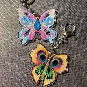 RUNA Y MARIPOSA DE LUZ DE FUEGO