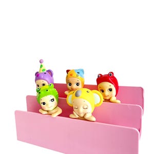 Sonny Angel Hipper Display - Colorful Character Figures with Unique Designs in Pink Box