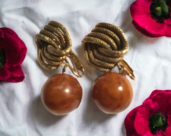 Boucles d'oreilles vintage à clip de perle de caramel foncé marbré de bakélite