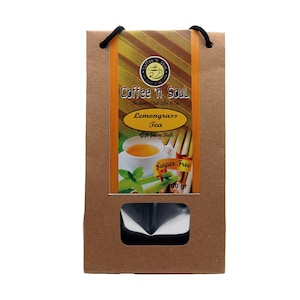 May include: A brown paper bag with black cord handles containing Lemongrass Tea. The label features the text Coffee 'n Soul, The Spirits of Bali Coffee & Tea, Lemongrass Tea, Gift from Bali, Sugar Free, and 100 gr, with an image of a tea cup.