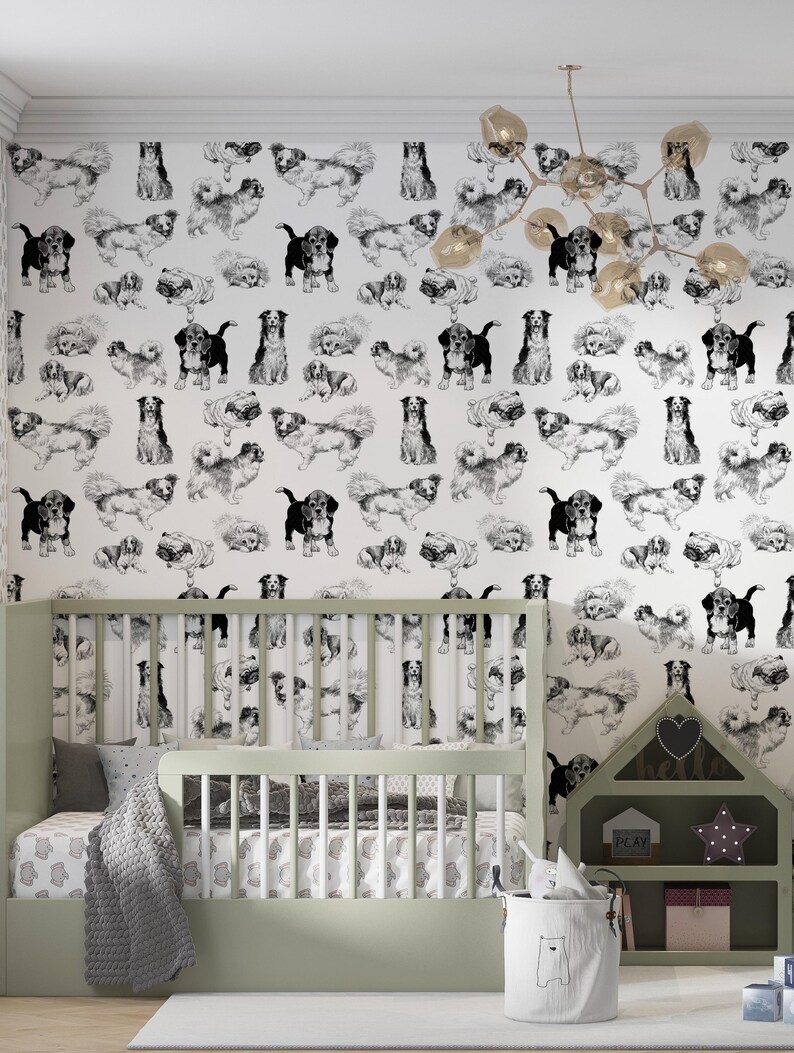 May include: Black and white illustration of various dog breeds in a repeating pattern on a white background. The wallpaper is in a nursery with a crib and a toy house.