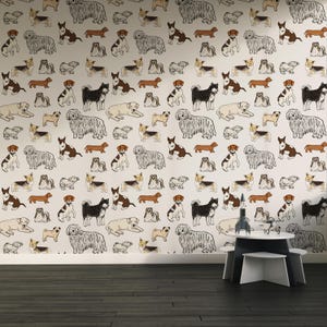 May include: Wallpaper featuring a repeating pattern of various dog breeds in black, brown, and cream colors on a white background. The dogs are in different poses. A small white table and stools are in the foreground.