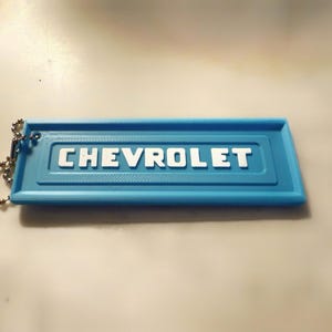 1950s Chevrolet Tailgate Keychain – Vintage Chevy Truck Emblem Key Ring