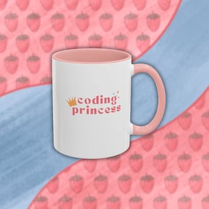 May include: White ceramic mug with a pink rim and handle. The mug has a pink and yellow design that says "coding princess" with a crown above the word "coding".