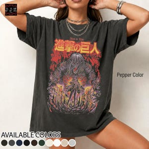 Vintage Eren Yeager Attack on Titan graphic tee mockup on pepper Comfort Colors 1717 oversized t-shirt featuring retro anime inspired artwork with faded streetwear aesthetic and garment dyed fabric.