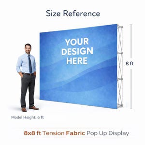 May include: A blue 244 x 244 cm tension fabric pop-up display with the text "YOUR DESIGN HERE". The display is 244 cm tall. A man in a blue shirt and grey trousers stands next to the display. The model's height is 183 cm.