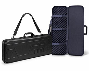 May include: A black hard-sided case with a shoulder strap and handle, designed for carrying long items. The case is open, revealing a padded interior with securing straps. The open case is next to a closed case.