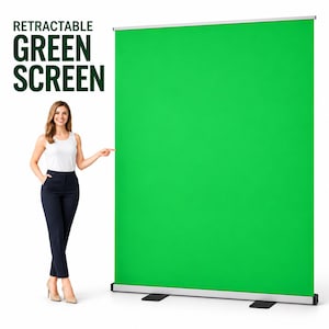 May include: A large, vertical, retractable green screen featuring a solid, vibrant green fabric surface. The unit is housed in a metallic silver base with two black feet for stability. The text RETRACTABLE GREEN SCREEN is printed in dark green.