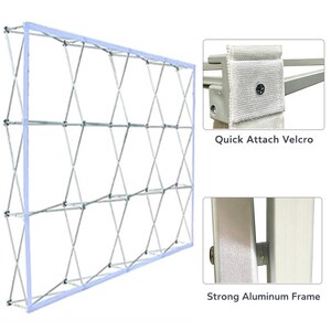 May include: A white and silver pop-up display frame with a crisscross support structure. The frame has a strong aluminium construction and quick-attach Velcro for easy setup. The text "Quick Attach Velcro" and "Strong Aluminum Frame" are visible.