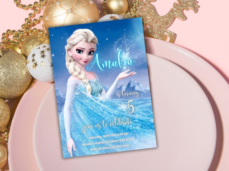 May include: A blue and white birthday invitation featuring a cartoon image of Elsa from the movie Frozen. The invitation says "Amalia is turning 5" and includes details for the party, including the date, time, and location.