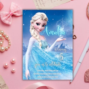 May include: A blue and white Frozen-themed birthday invitation with a picture of Elsa. The invitation says "Amalia is turning 5, join us to celebrate" and includes the date, time, location, and RSVP information.