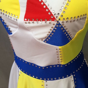 katy perry beach ball dress Wore Not One But Four Awesome Super Bowl Halftime Show Outfits I was first inspired to create the 2 piece costume that was inspired by the KP Superbowl Beach Ball outfit but now it is available as a dress with sleeves Katy Perry's Disco-Ball Gown Had