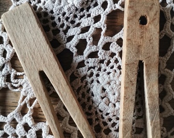Old clothespins - storm pegs made of wood - antique - country house decoration