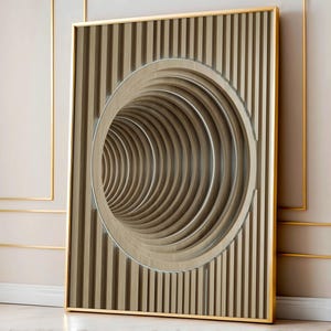 Könnte beinhalten: Ein gerahmtes Kunstwerk mit einer 3D-optischen Täuschung. Das Design zeigt einen kreisförmigen Tunneleffekt in einem rechteckigen Rahmen. Das Kunstwerk ist hauptsächlich beige und braun, mit einem goldfarbenen Rahmen.