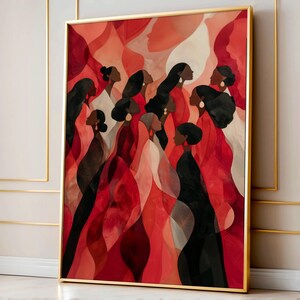 May include: An abstract art print featuring a group of women in profile, rendered in shades of red, black, and white. The artwork is framed in a gold-colored frame. The women are depicted with dark hair and wearing earrings.