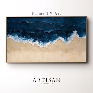 May include: Abstract painting of a blue ocean with white waves crashing on a sandy beach. The painting is framed in a gold frame. The text "Frame TV Art" is at the top of the image and "ARTISAN ART COLLECTION" is at the bottom.