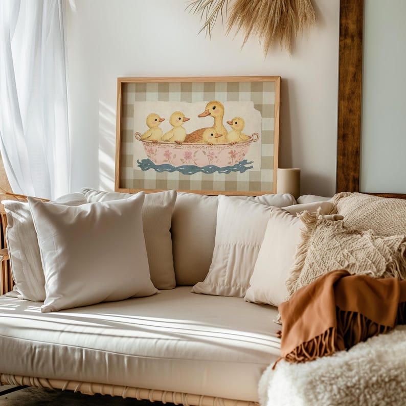Whimsical illustration of a mother duck with four fluffy ducklings sitting together in a vintage pink floral teacup, placed against a soft beige textured background layered on top of a brown gingham pattern.
Duck wall art cute duck art kids room decor bathroom wall decor duck lover gift baby shower gift kids bathroom decor cute duck print trendy wall art printable wall art beige plaid gingham print cottagecore decor digital download duck nursery print vintage duck art beige gingham nursery.