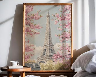 May include: A framed print of the Eiffel Tower in Paris, France, with pink cherry blossoms in the foreground. The print has a vintage aesthetic and is set against a white wall.