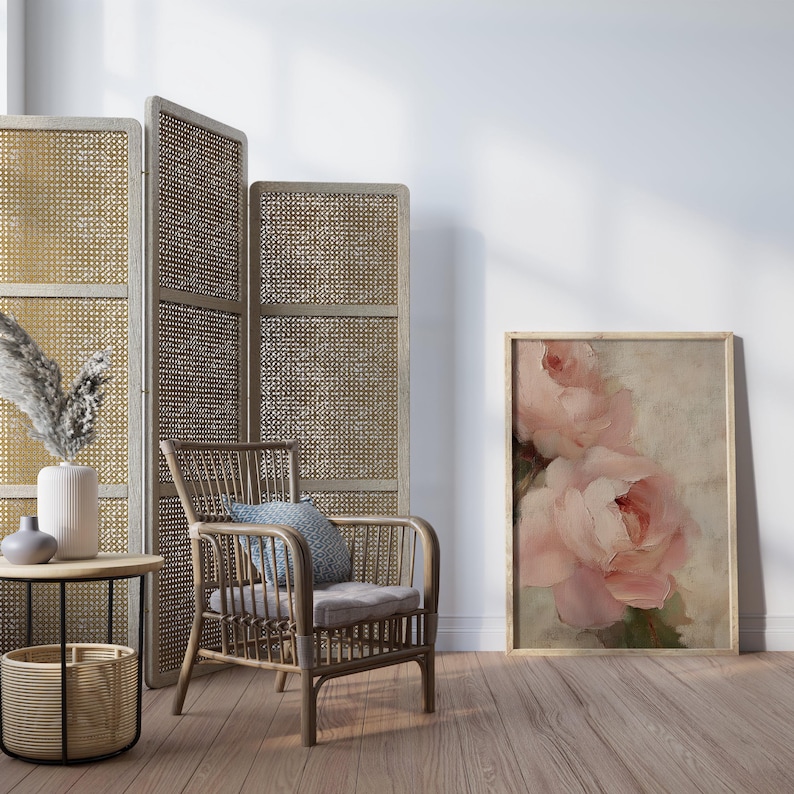 A beautifully textured oil painting of soft blush pink roses against a muted beige background. The brushstrokes create a rich depth and realism, while the pastel tones and gentle blending give the painting a romantic and dreamy feel. The artwork has an impressionistic style, perfect for adding an elegant and timeless floral touch to any space.
This artwork is a close-up of a delicately textured oil painting featuring soft pink roses.