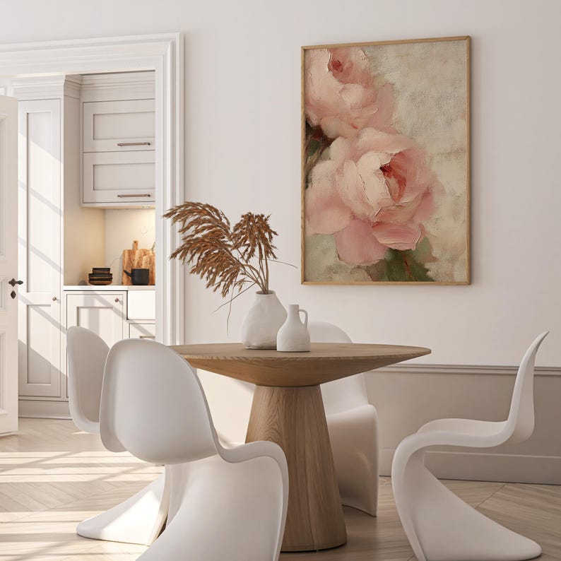 A beautifully textured oil painting of soft blush pink roses against a muted beige background. The brushstrokes create a rich depth and realism, while the pastel tones and gentle blending give the painting a romantic and dreamy feel. The artwork has an impressionistic style, perfect for adding an elegant and timeless floral touch to any space.
This artwork is a close-up of a delicately textured oil painting featuring soft pink roses.