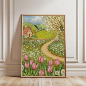 Watercolor illustration of a spring cottage meadow with pink tulips, white daisies, a winding path, and a small countryside house under blooming trees in cottagecore style. Spring landscape farmhouse decor cozy cottage printable wall art cottage decor cozy home decor spring flowers digital download pink tulip wall art tulip wall decor.