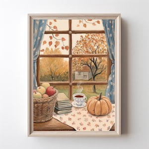 Puede incluir: Una pintura de acuarela enmarcada representa una escena otoñal acogedora. Una ventana revela una vista del follaje otoñal y una pequeña casa. Una cesta de manzanas, libros, una taza de té y una calabaza descansan sobre un mantel floral.