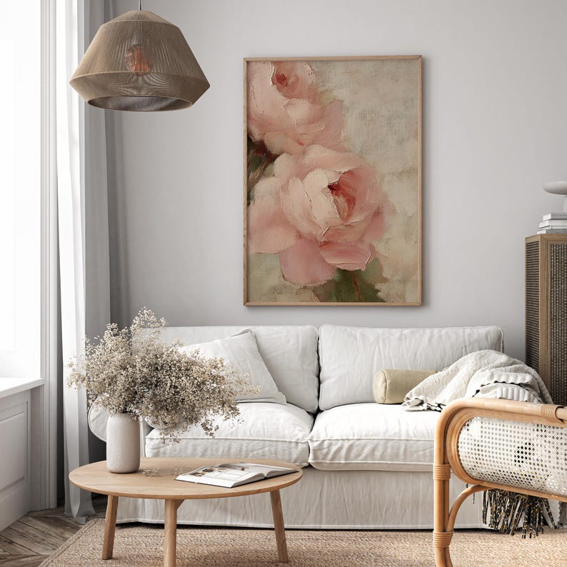 A beautifully textured oil painting of soft blush pink roses against a muted beige background. The brushstrokes create a rich depth and realism, while the pastel tones and gentle blending give the painting a romantic and dreamy feel. The artwork has an impressionistic style, perfect for adding an elegant and timeless floral touch to any space.
This artwork is a close-up of a delicately textured oil painting featuring soft pink roses.