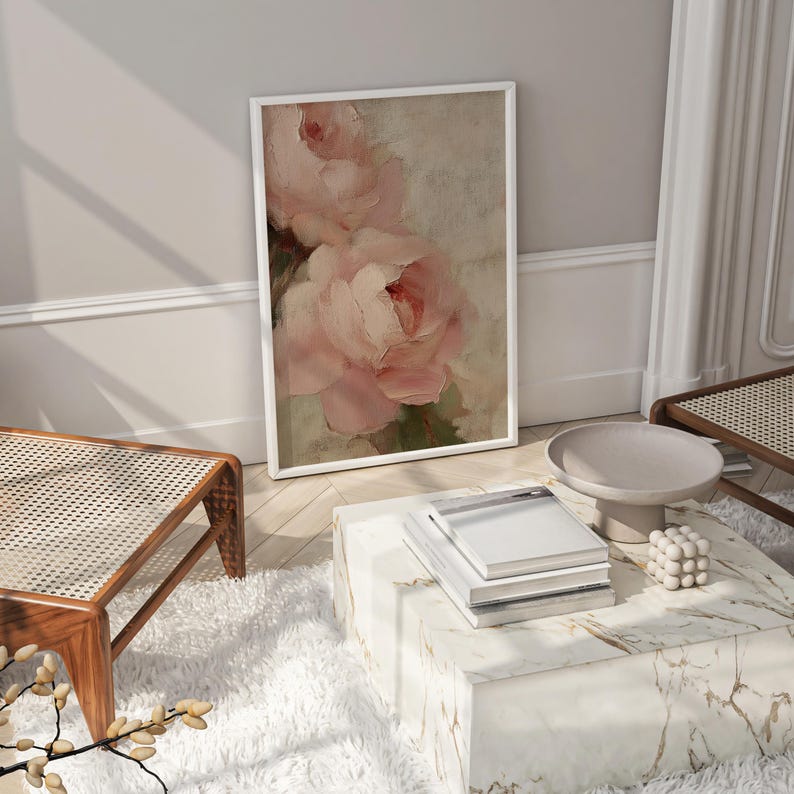 A beautifully textured oil painting of soft blush pink roses against a muted beige background. The brushstrokes create a rich depth and realism, while the pastel tones and gentle blending give the painting a romantic and dreamy feel. The artwork has an impressionistic style, perfect for adding an elegant and timeless floral touch to any space.
This artwork is a close-up of a delicately textured oil painting featuring soft pink roses.