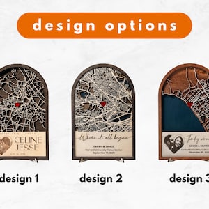 May include: Three wooden map designs with arched tops. Each features a detailed city map with a red heart marking a location. Design 1 has names and a date. Design 2 has text "Where it all began". Design 3 has a photo and text.
