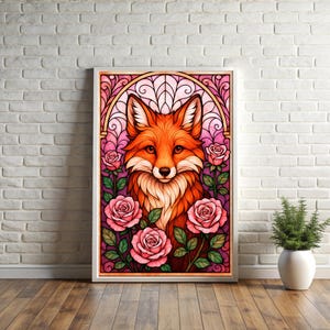 May include: A framed art print depicting a fox with orange and white fur, set against a pink and purple stained-glass style background. Pink roses and green leaves surround the fox. The artwork is displayed on a white brick wall.