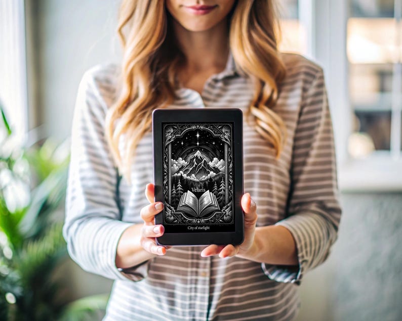 May include: A woman is holding a black e-reader with a cover image of a book with the title "Velaris, City of Nightlight". The cover art is a black and white illustration of a mountain range with a starry sky.
