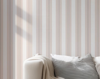 May include: Wallpaper featuring a vertical striped pattern in shades of soft pink, light gray, and white. The design consists of repeating thin and thick lines arranged in a parallel sequence, creating a clean and structured visual effect on the wall.