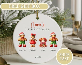 May include: A white ceramic Christmas ornament with the text "Nana's Little Cookies" and the names Jacob, Olivia, Max, and Noah. The ornament features gingerbread people and a dog, with the year 2025.