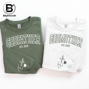 Godmother Sweatshirt,
Godfather Sweatshirt,
Custom Godparent
Baptism Gift Outfit,
Godparent Proposal,
Baby Christen Gift,
Embroidered Est tee,
New Baby Gift Idea,
Est Year Sweatshirt,
Baby Dedication Gift,
Matching Family Tops,
fathers day gifts,
Pregnancy Reveal Top,