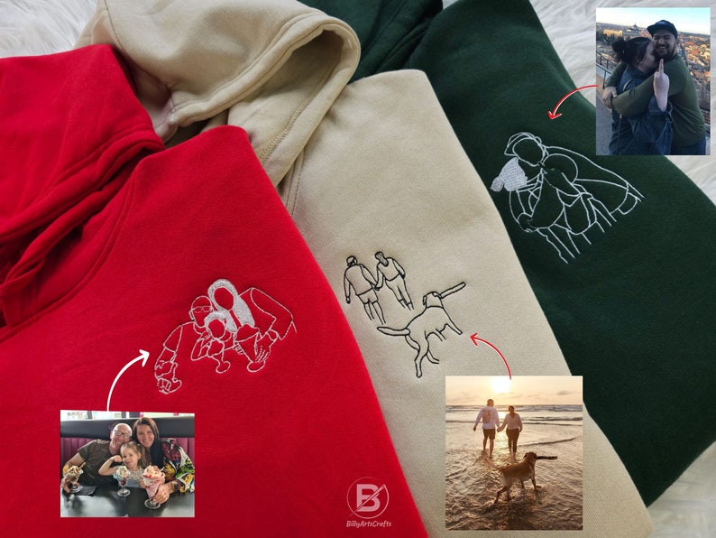 May include: Three hooded sweatshirts in red, beige, and green with white embroidered images of people and a dog. Each sweatshirt has a photo of a different family on the sleeve.
