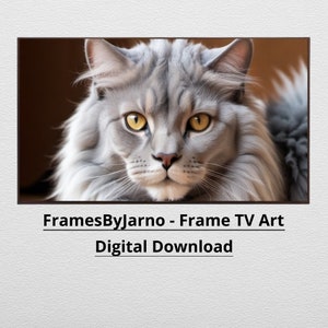 May include: A close-up portrait of a grey and white Maine Coon cat with bright yellow eyes. The cat is looking directly at the camera. The image is framed with a brown border and the text "FramesByJarno - Frame TV Art Digital Download" is below the image.