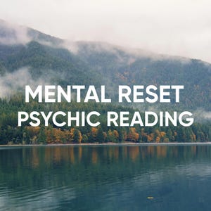 May include: A scenic landscape featuring a calm lake reflecting the surrounding mountains and trees. The text "MENTAL RESET PSYCHIC READING" is displayed in large white letters across the image, suggesting a service related to mental well-being and spiritual guidance.