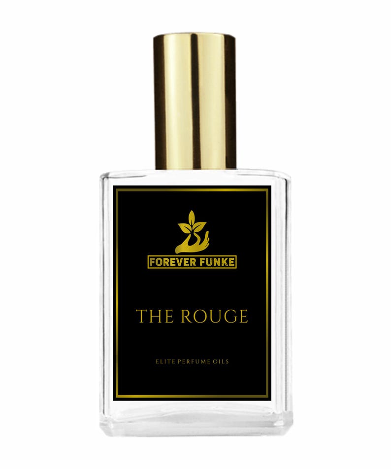 Puede incluir: Botella de perfume de vidrio transparente con tap&oacute;n dorado. La etiqueta negra presenta el texto dorado "FOREVER FUNKE" sobre "THE ROUGE" y "ELITE PERFUME OILS". La botella tiene forma rectangular.