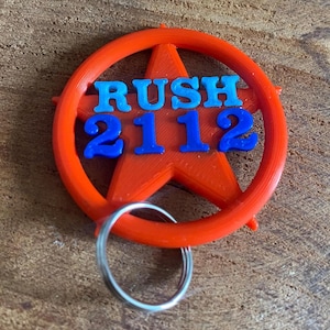 Rush 2112 keychain from the album 2112. For every Rush fan merchandise rush logo. As a perfect gift for Fathers day.