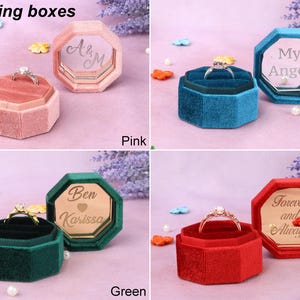 four ring boxes with different designs on them