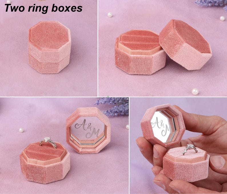 a pink ring box with two rings inside of it