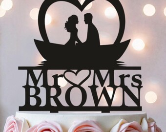 Kanobruidstaarttopper: rustiek MrMrs Boat-thema